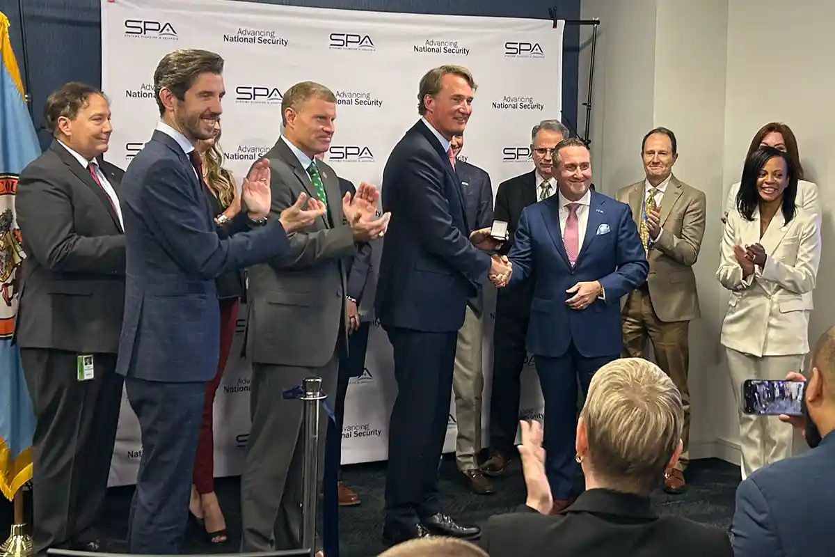 Gov. Glenn Youngkin and officials with SPA CEO