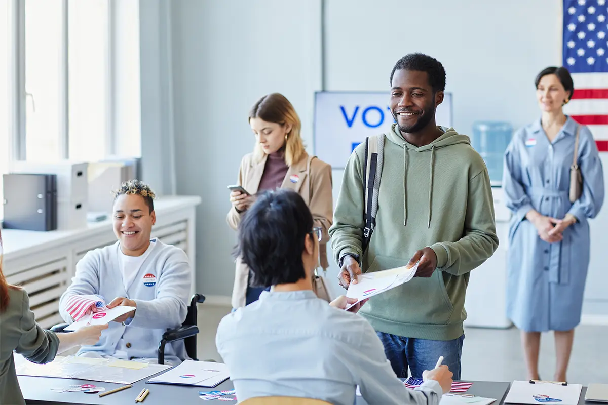 people voting at a polling location