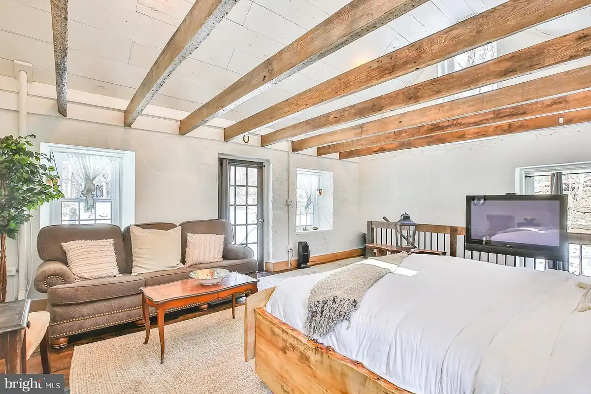 loft bedroom with sitting area