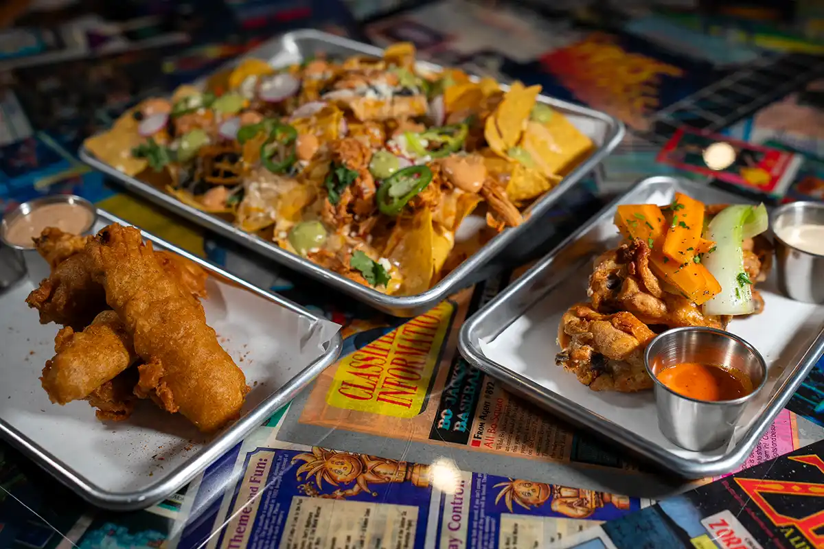 nachos and fried fish from continues arcade