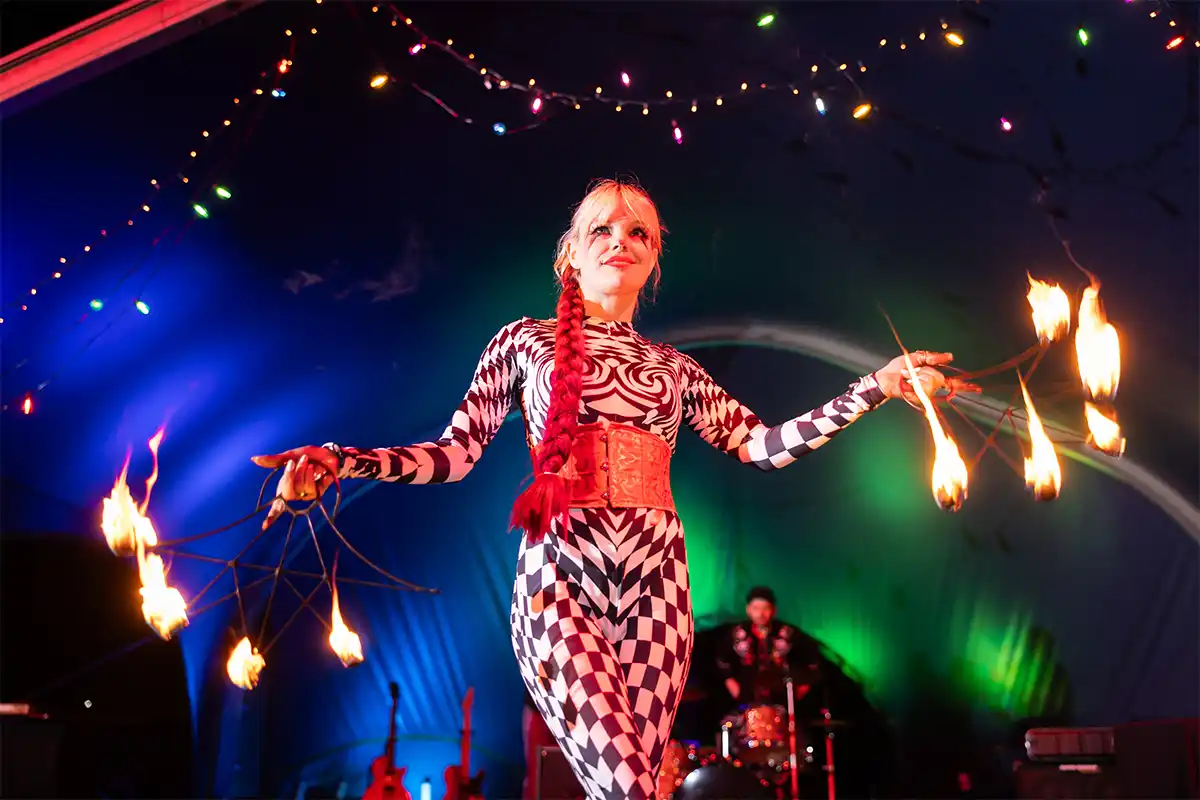 circus performer at night of the living zoo