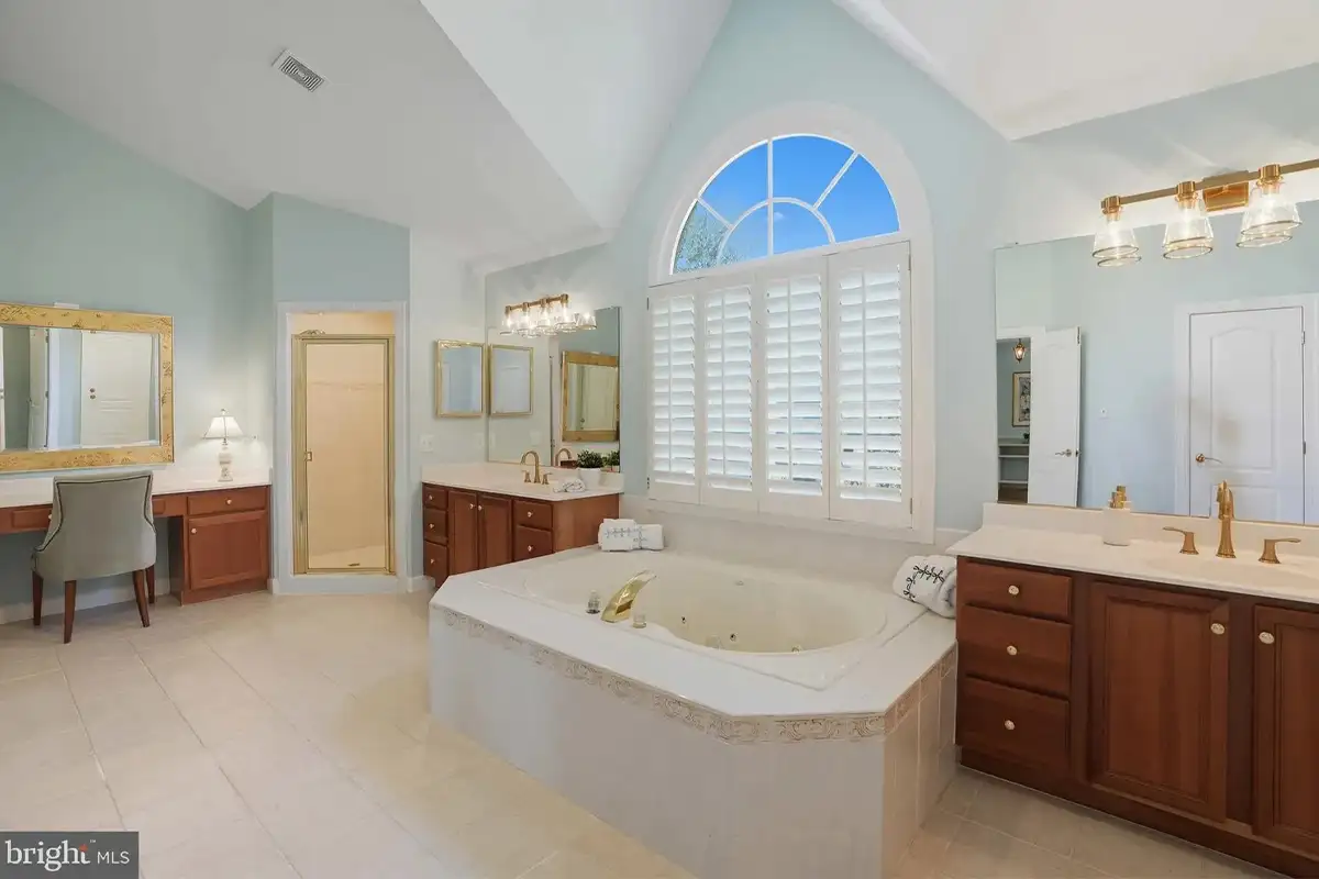Spa-inspired primary bathroom inside 3014 Apple Brook Ln. 