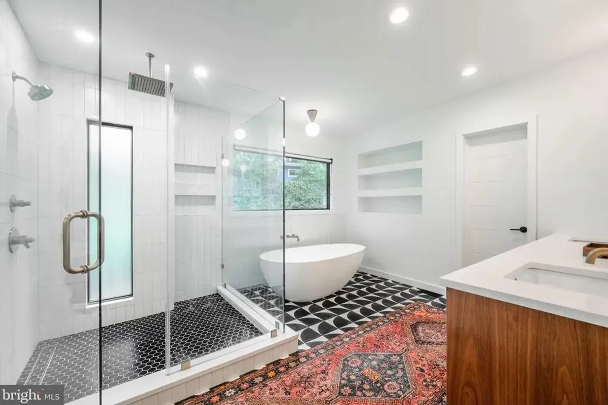 The primary bathroom with a freestanding bathtub.