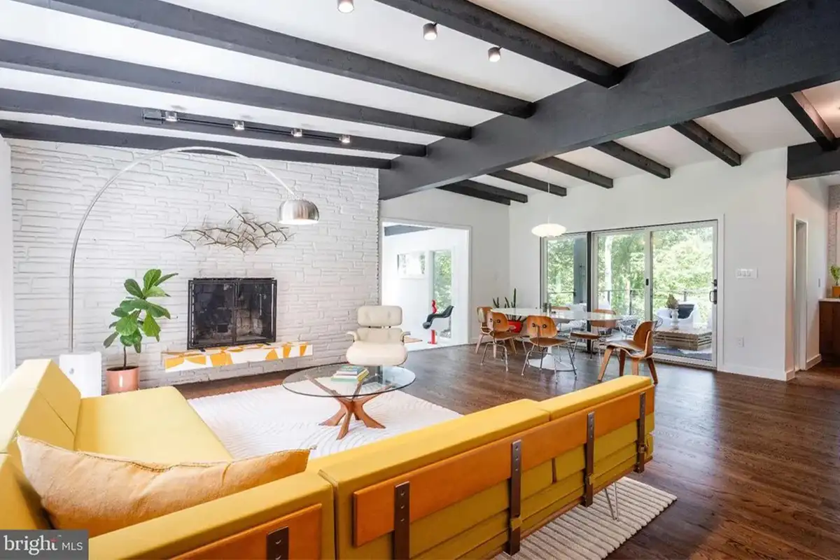 The living room with a wood-burning fireplace. 