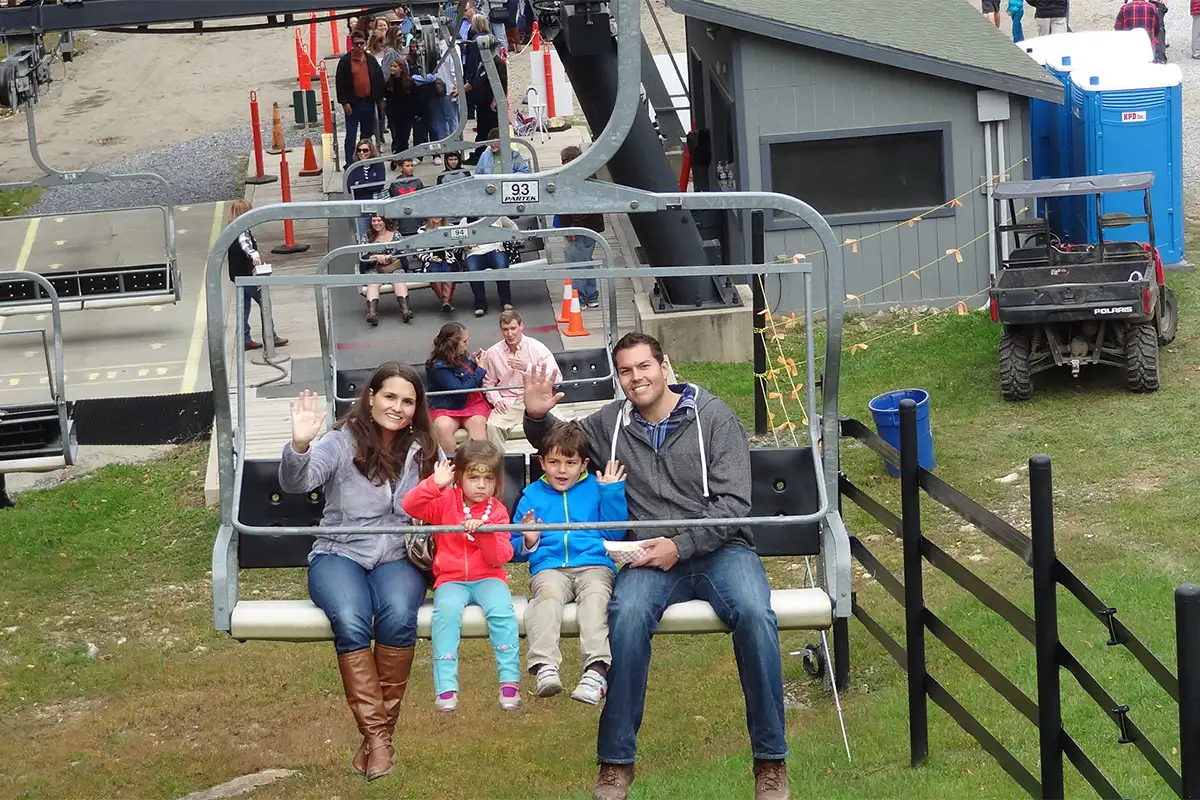 A family on a chairlift at Massanutten Fall Harvest Days 