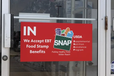 SNAP benefit sign on a store door