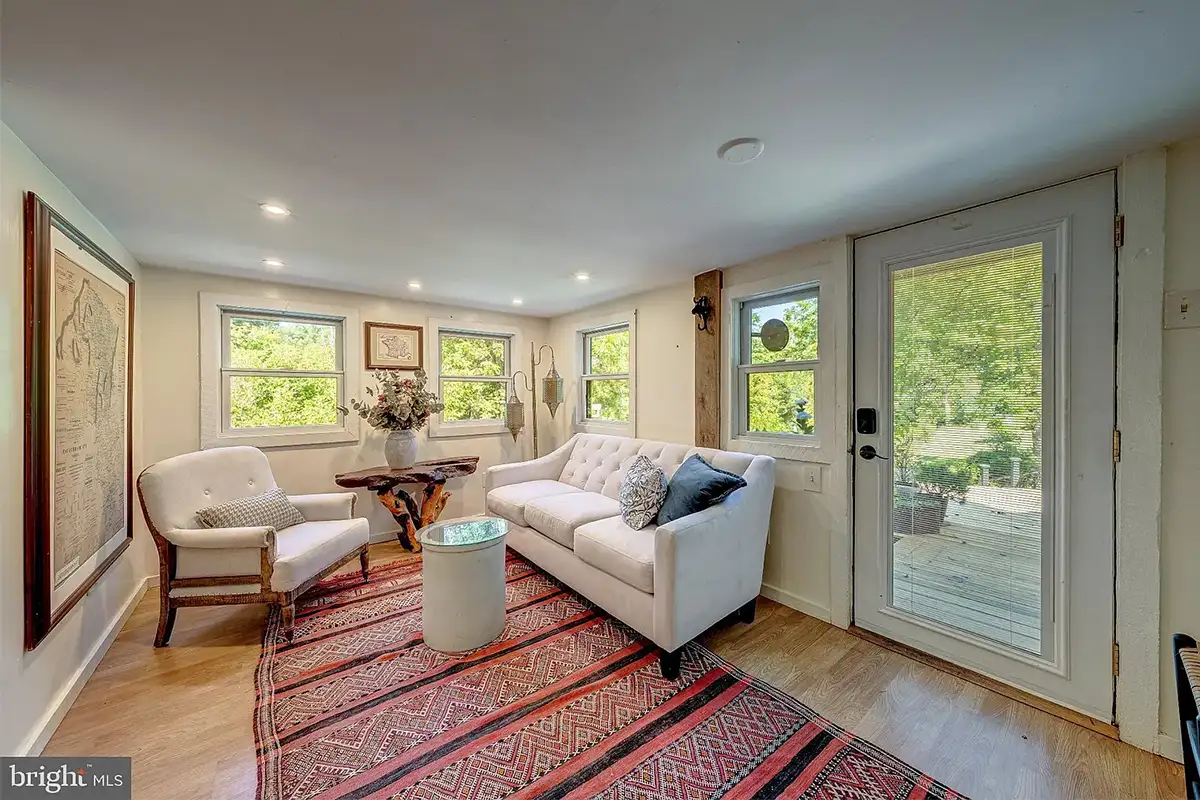 Living and sunroom at 3225 Sage Rd.