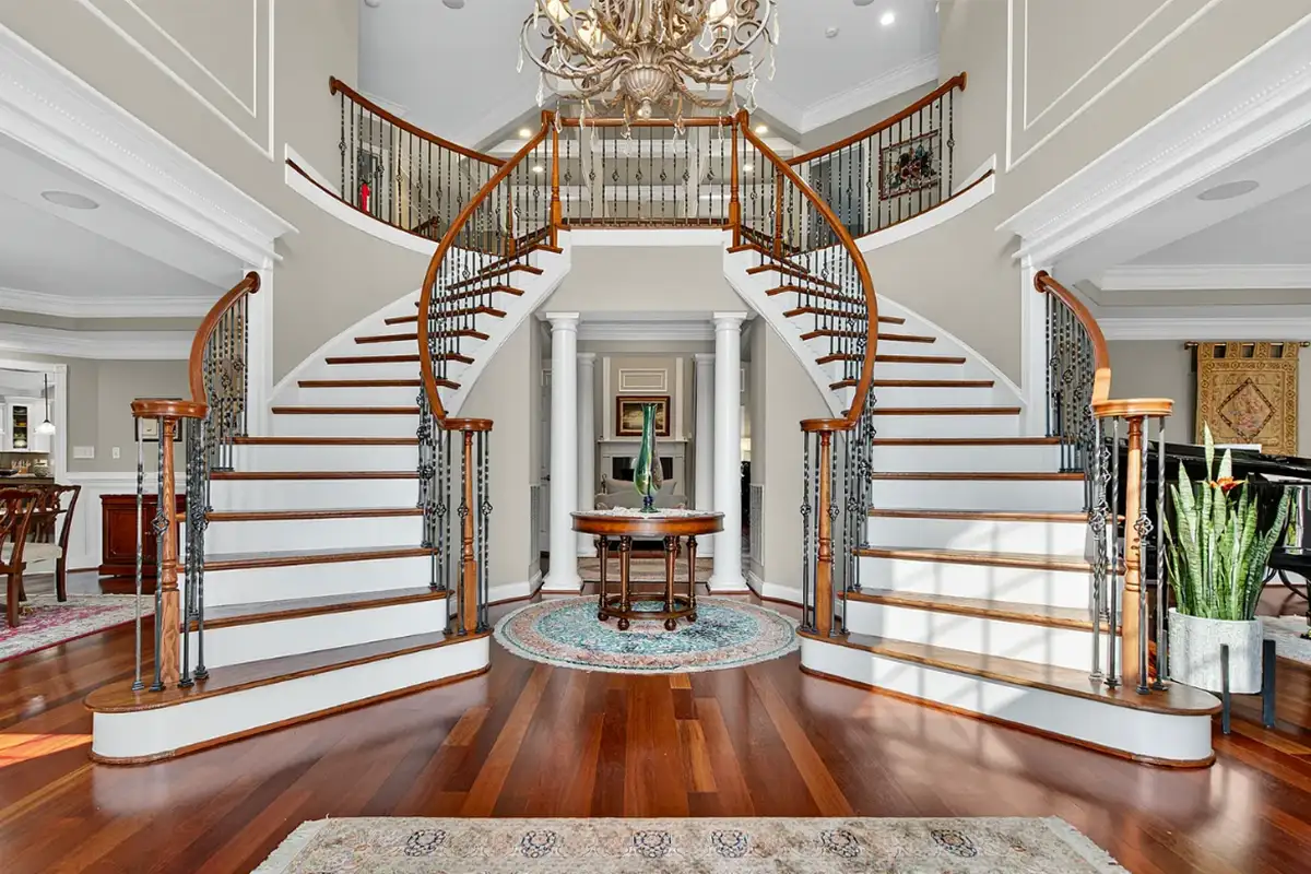 Dual staircase foyer in 7484 Wilson Rd. 