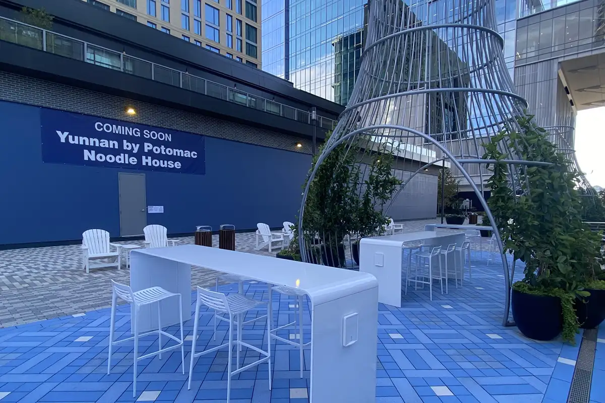 The coming soon sign for Yunnan by Potomac Noodle House in Reston Town Center Next