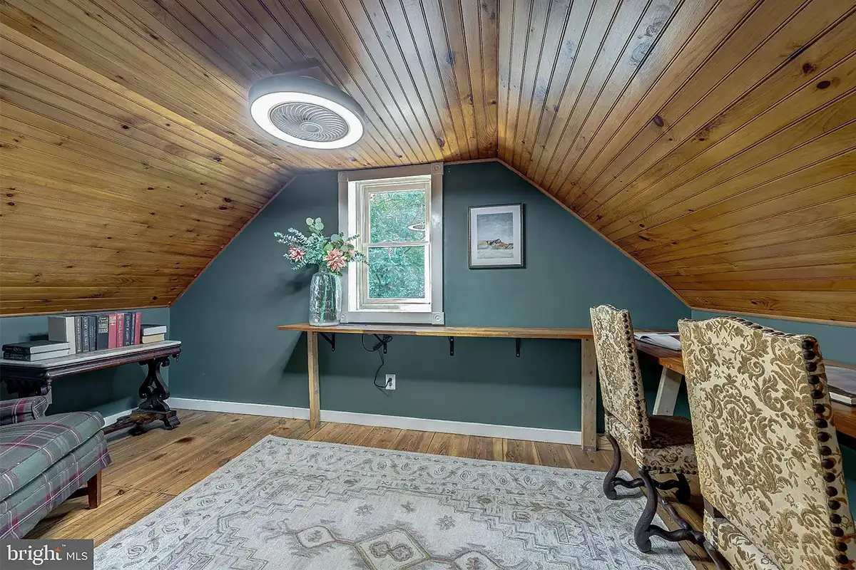 A den with coved ceilings at 3225 Sage Rd. 