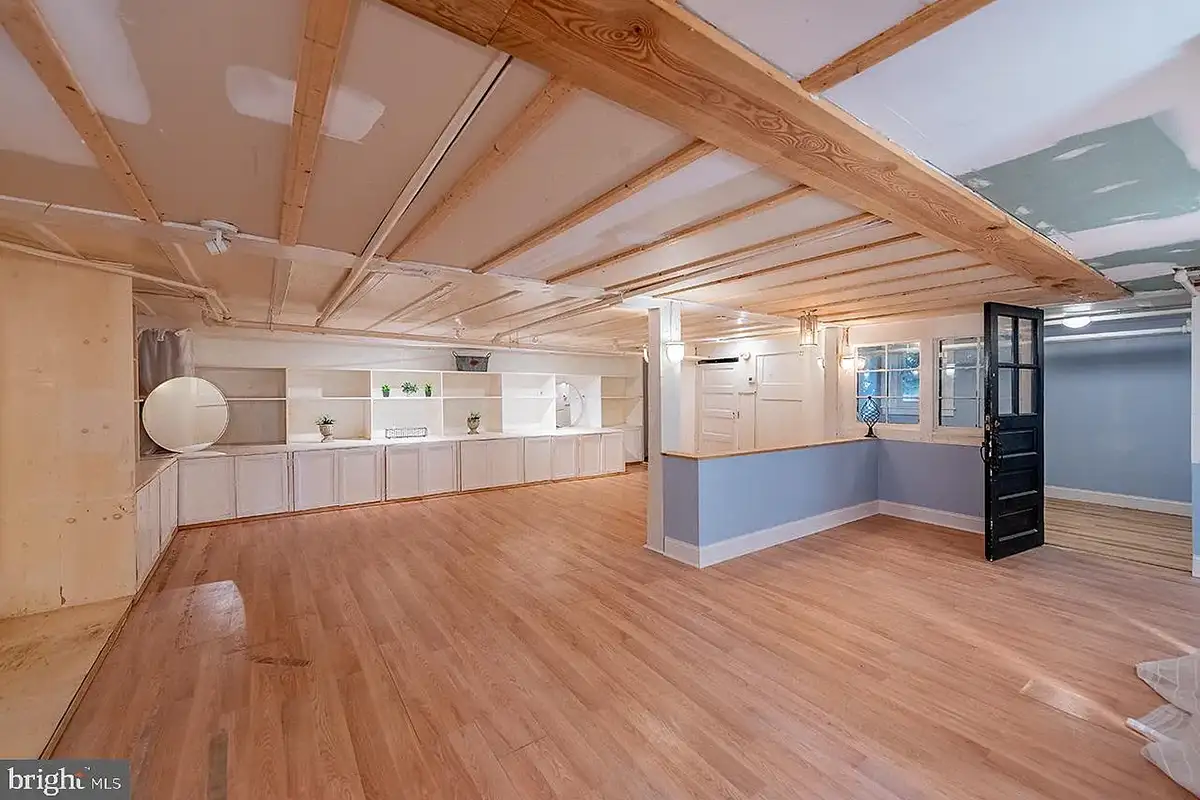 The basement with built-in cabinets and shelves at 222 Locust St.