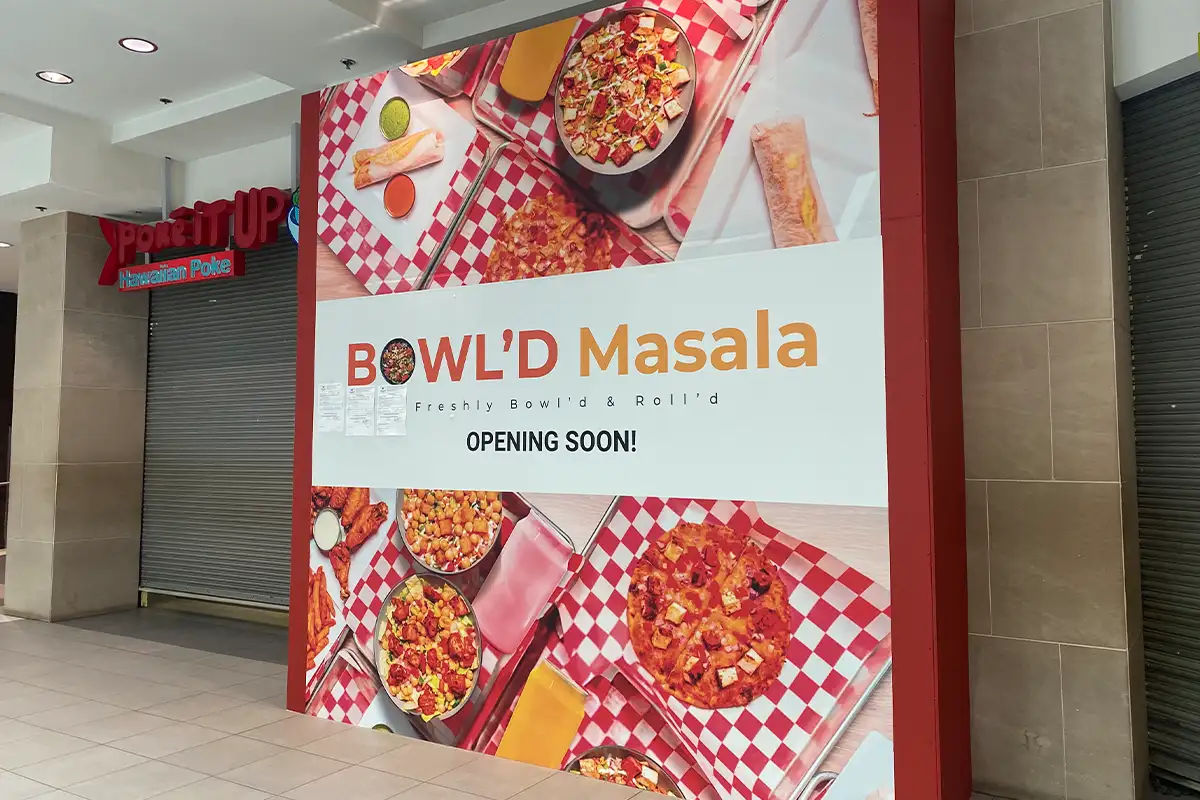 The "coming soon" sign for Bowl'd Masala in the Fashion Centre at Pentagon City.