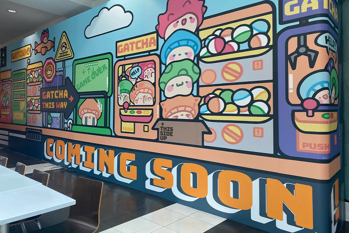 The "coming soon" sign for Gatcha in the Fashion Centre at Pentagon City