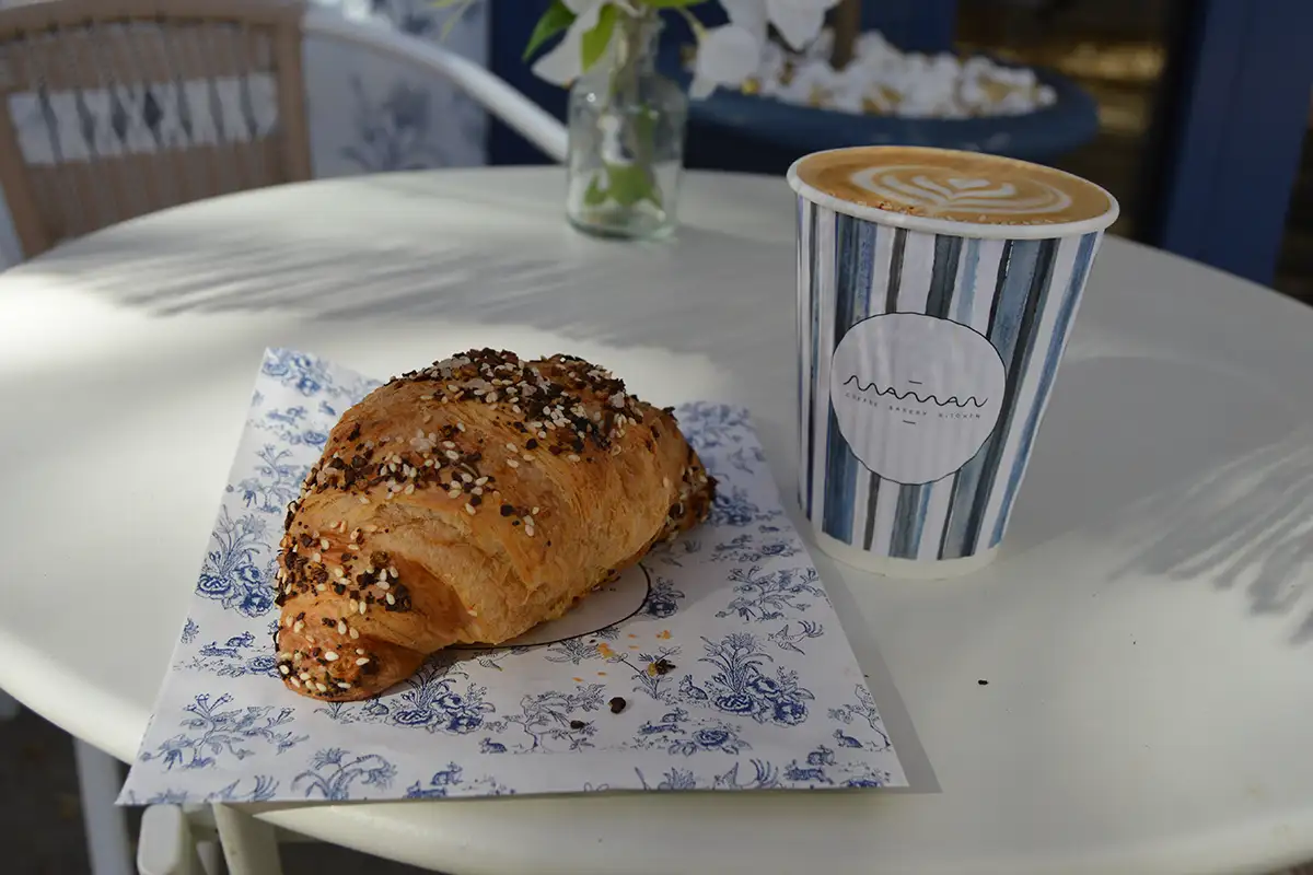 An everything croissant and a specialty latte from Maman in the Mosaic District.  