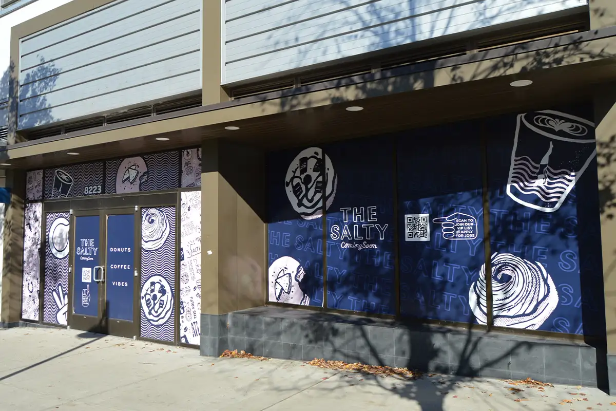 The "coming soon" signs for The Salty in the Mosaic District. 