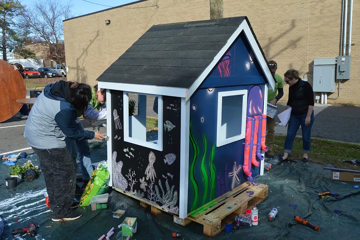 Grunley Construction team green underwater playhouse design.