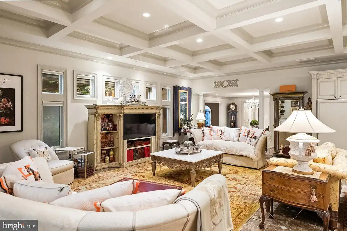 family room with coffered ceiling