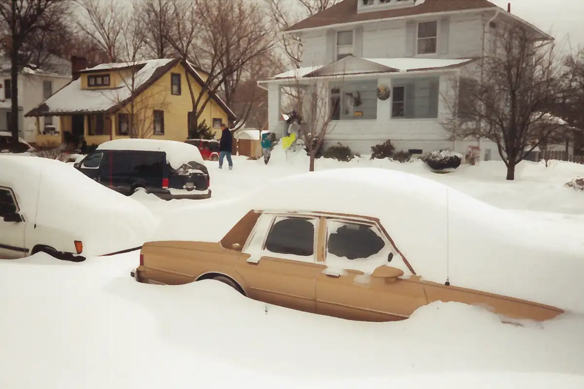 Snow covering cars and street in Alexandria