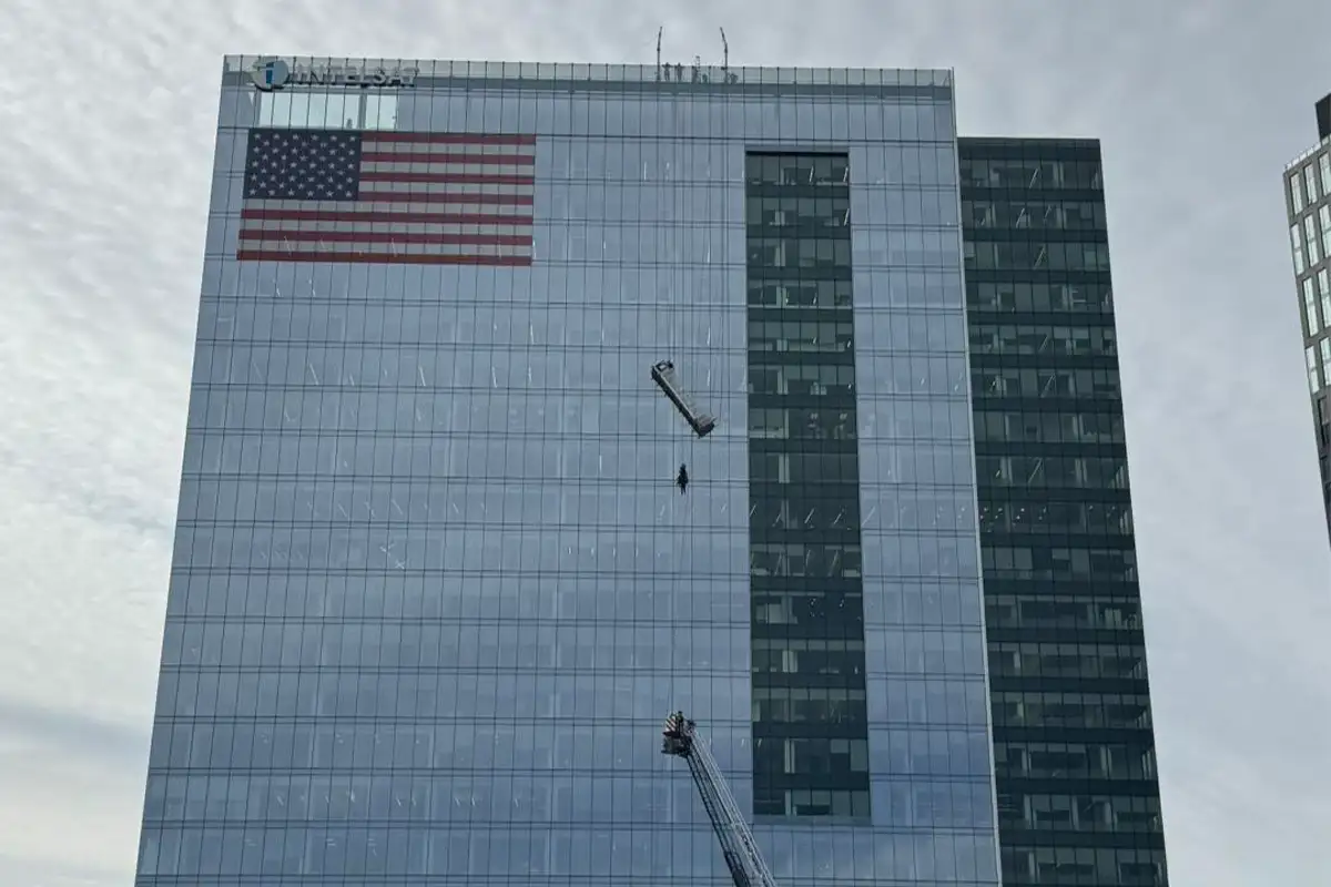 Window washers dangling from a Tysons building