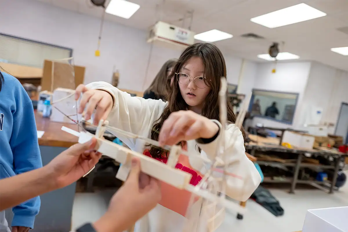 a female student team member of Longfellow's science Olympiad team