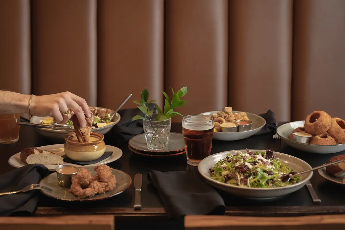 food and drink on a table at Joe Theismann’s Restaurant