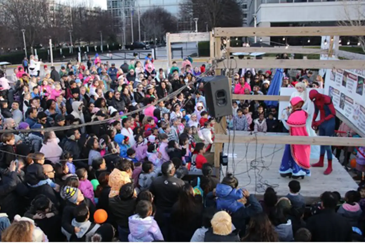 kids gather before the stage at a family New Years Eve event at Shipgarten