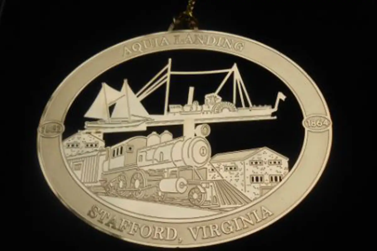 Stafford County Historical Society 60th Anniversary ornament is an oval made of 24k gold-layered brass and crafted by artisans in Williamsburg.