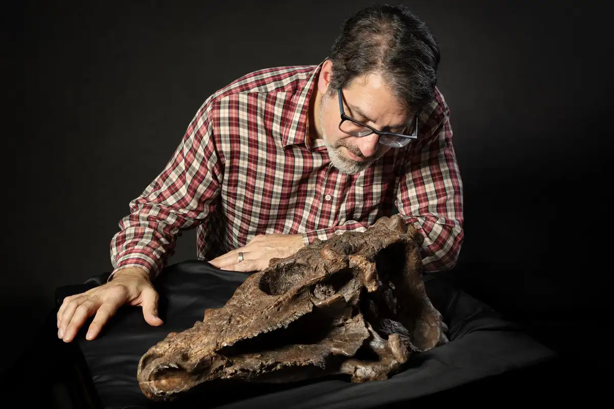 Matthew Carrano with Pachycephalosaurs skull 