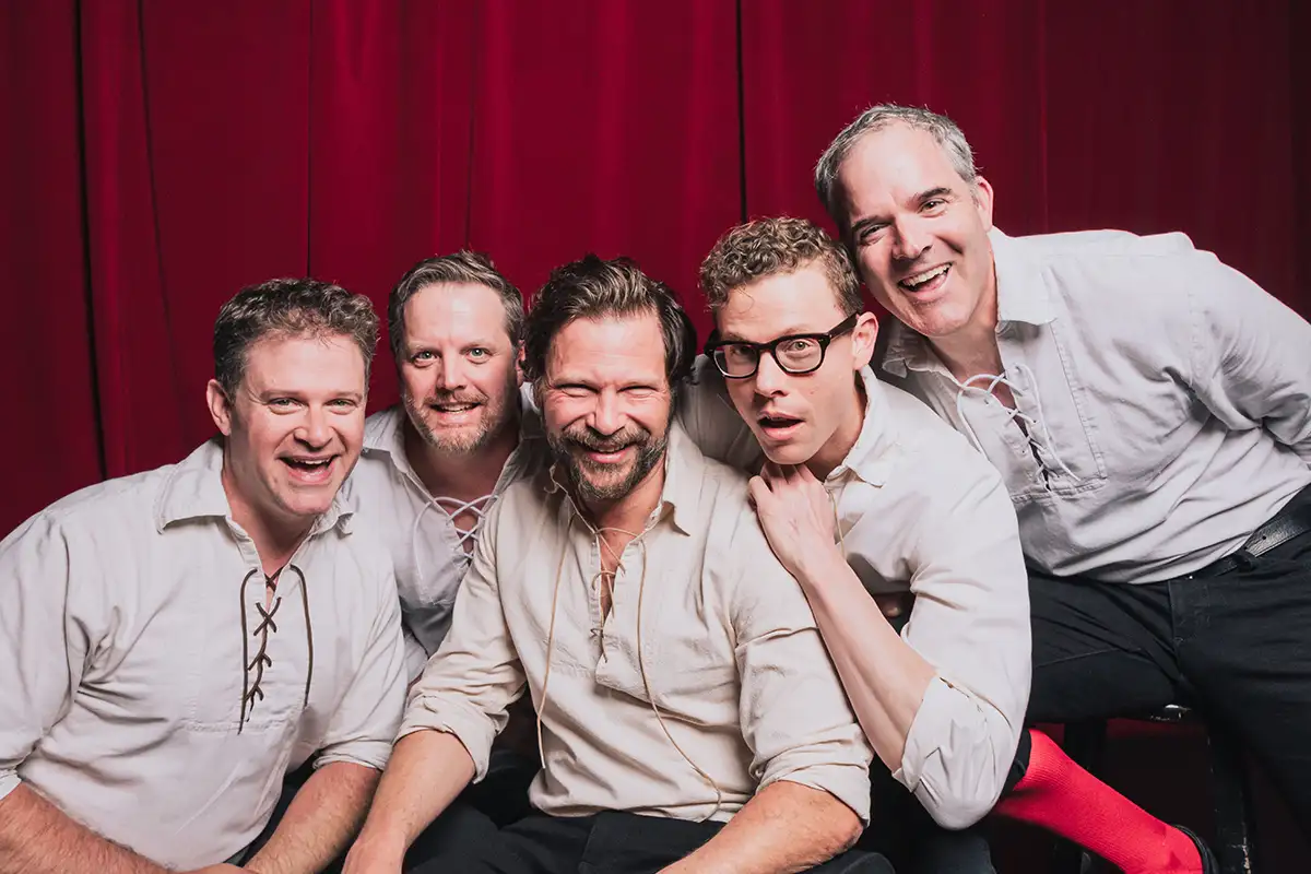 A headshot of performers from The Improvised Shakespeare Company
