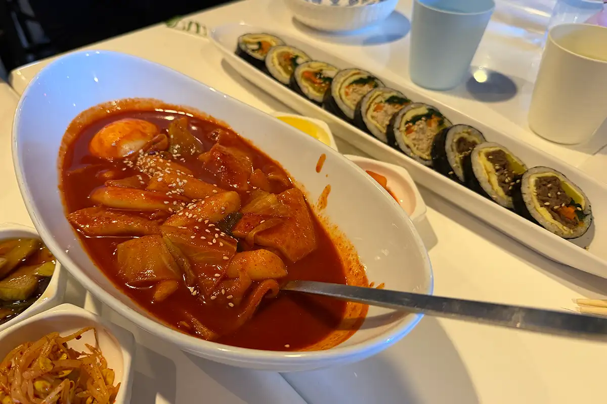 a table with dishes of Korean food