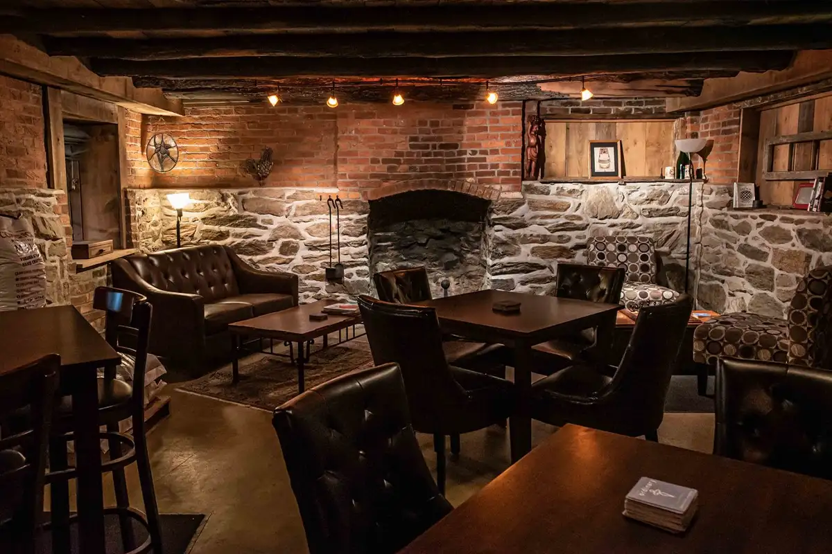 Table and chairs will brick and stone walls in Hopkins Ordinary in Sperryville