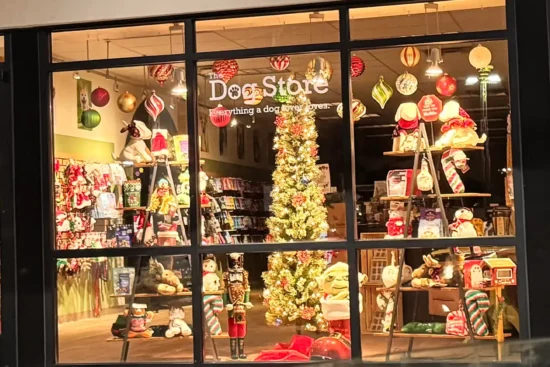 The front window of The Dog Store in Alexandria decorated for Christmas
