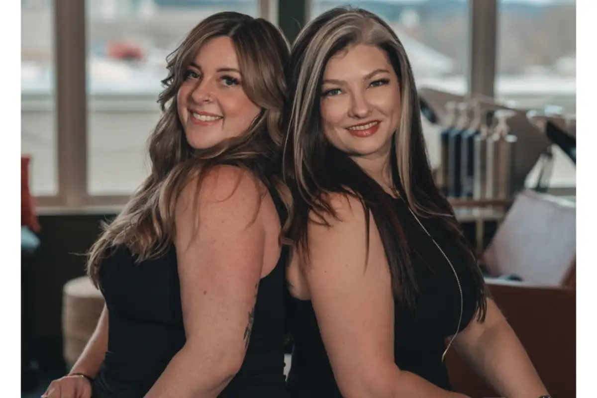 Two women with long hair
