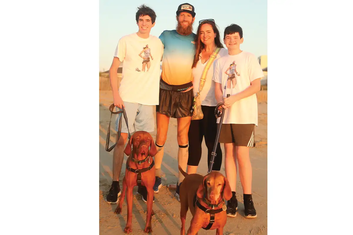 Wardian with wife Jennifer, sons Pierce and Grant, and dogs Rosie and Bash 