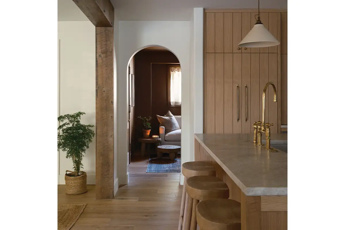 Archway looking from kitchen to living area in Reston home