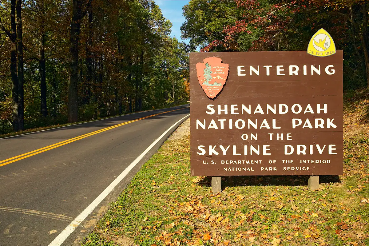 sign that says "Entering Shenandoah National Park on the Skyline Drive"
