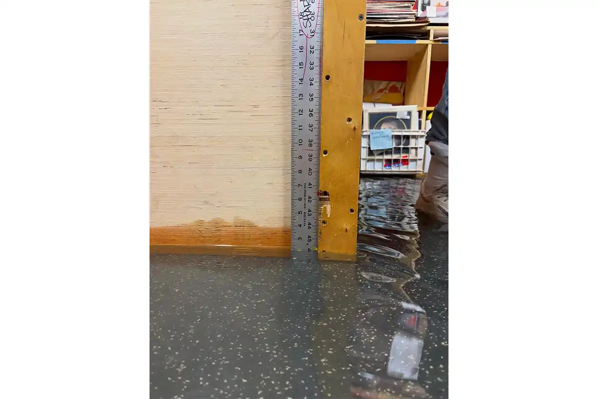 ruler showing the amount of flooding at crooked beat records