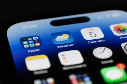 an iPhone showing apps including for weather