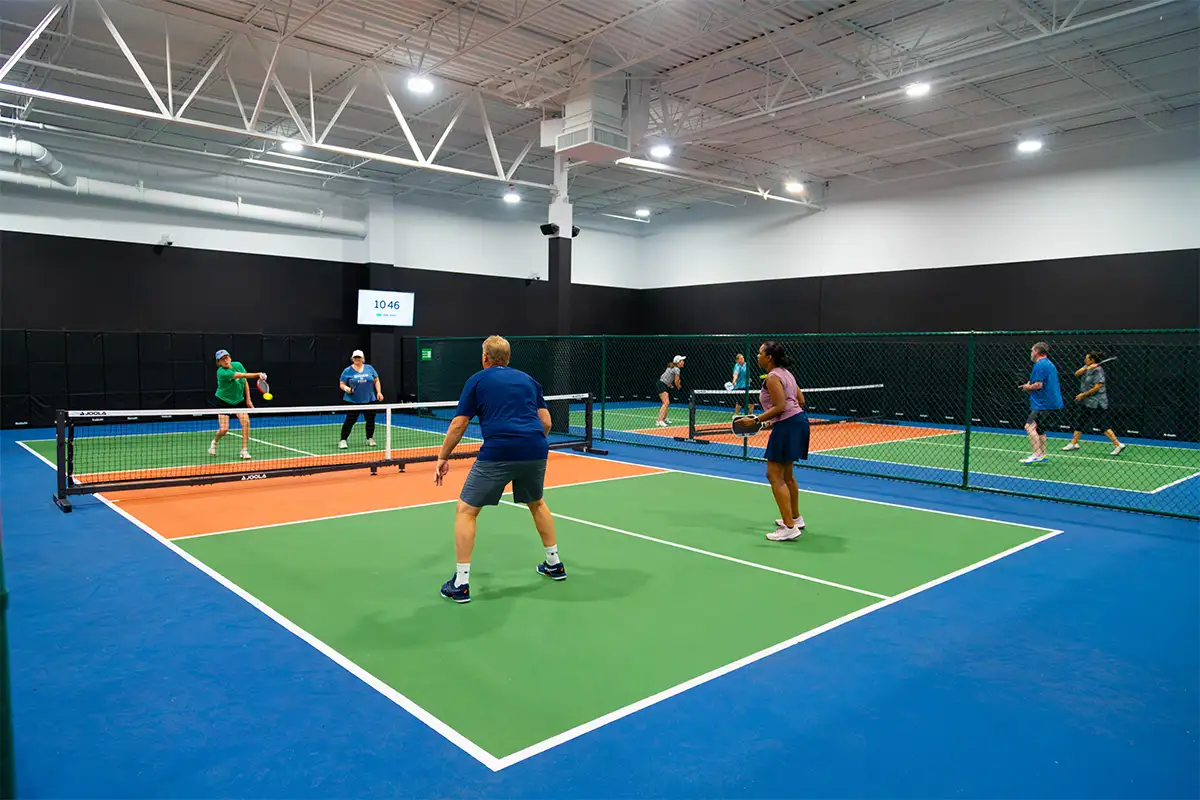 pickleball players on a court