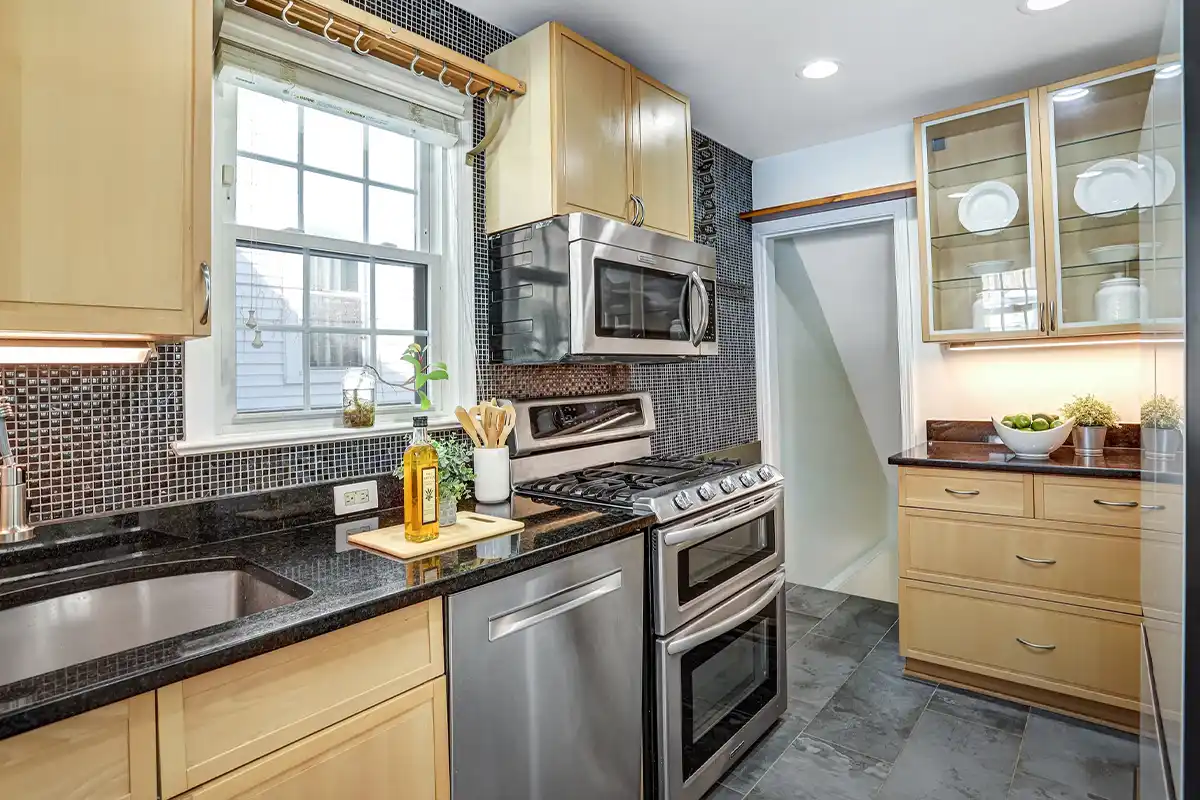 kitchen with custom cabinets and granite countertops