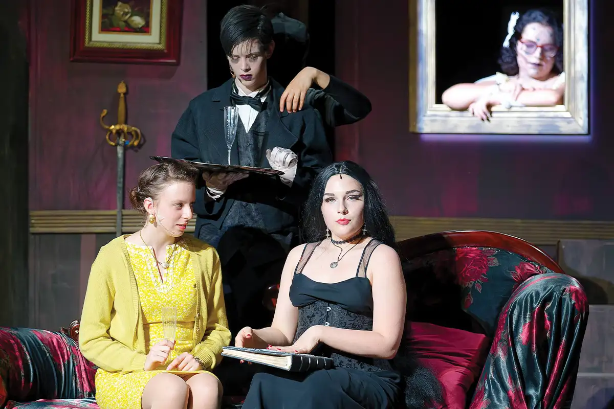Falls Church High School students Juliana Esen, Sebastian Neff, Miles Alexander, Kate Schlageter-Prettyman, and Cat Azenas perform in The Addams Family in 2025
