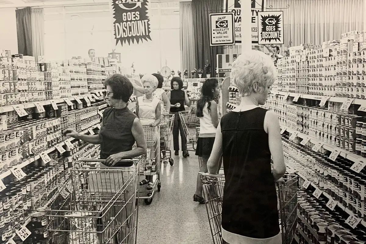 historic image of people shopping the aisles at Giant Food