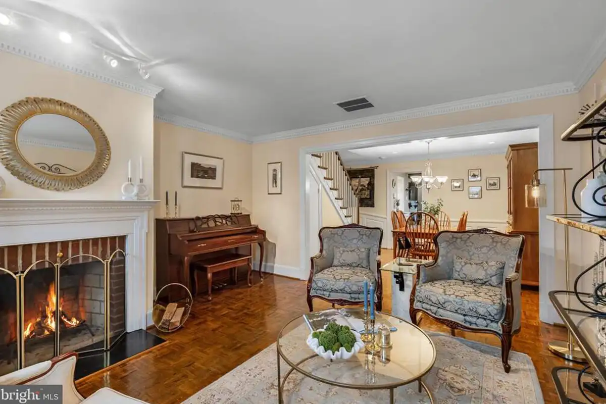 Living room with fireplace and hardwood floors