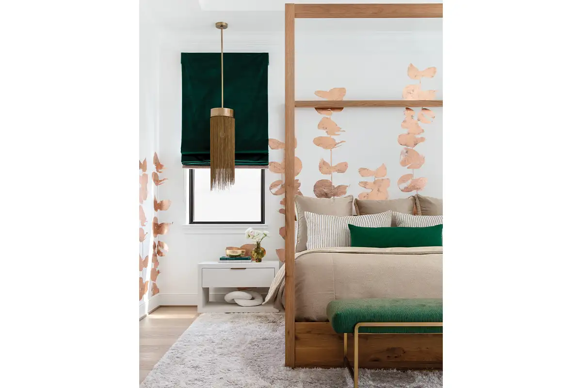 Bedroom with gold floral accents on walls