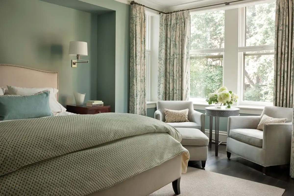 Bedroom with green walls and green furniture