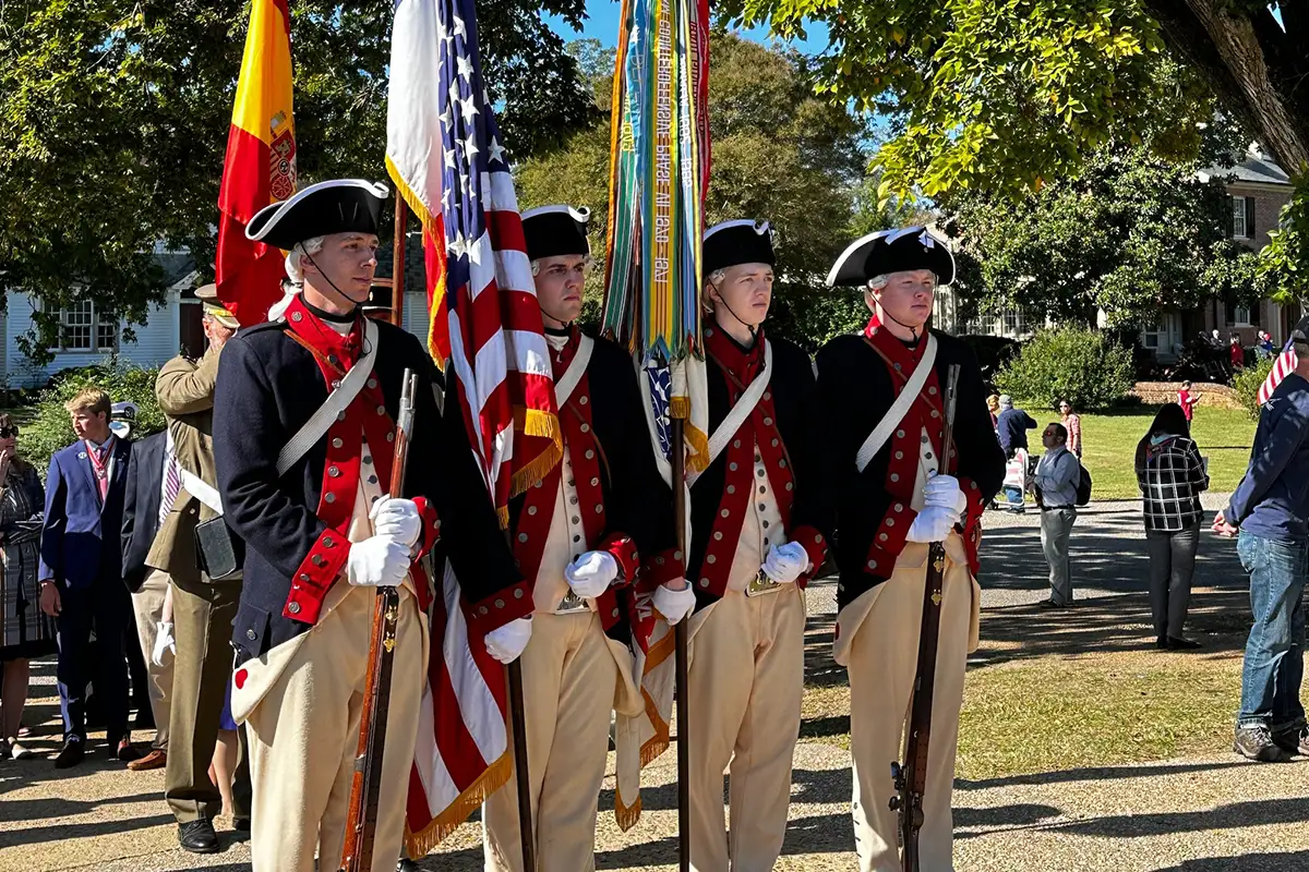 Yorktown Battlefield soldiers with flags reenactment