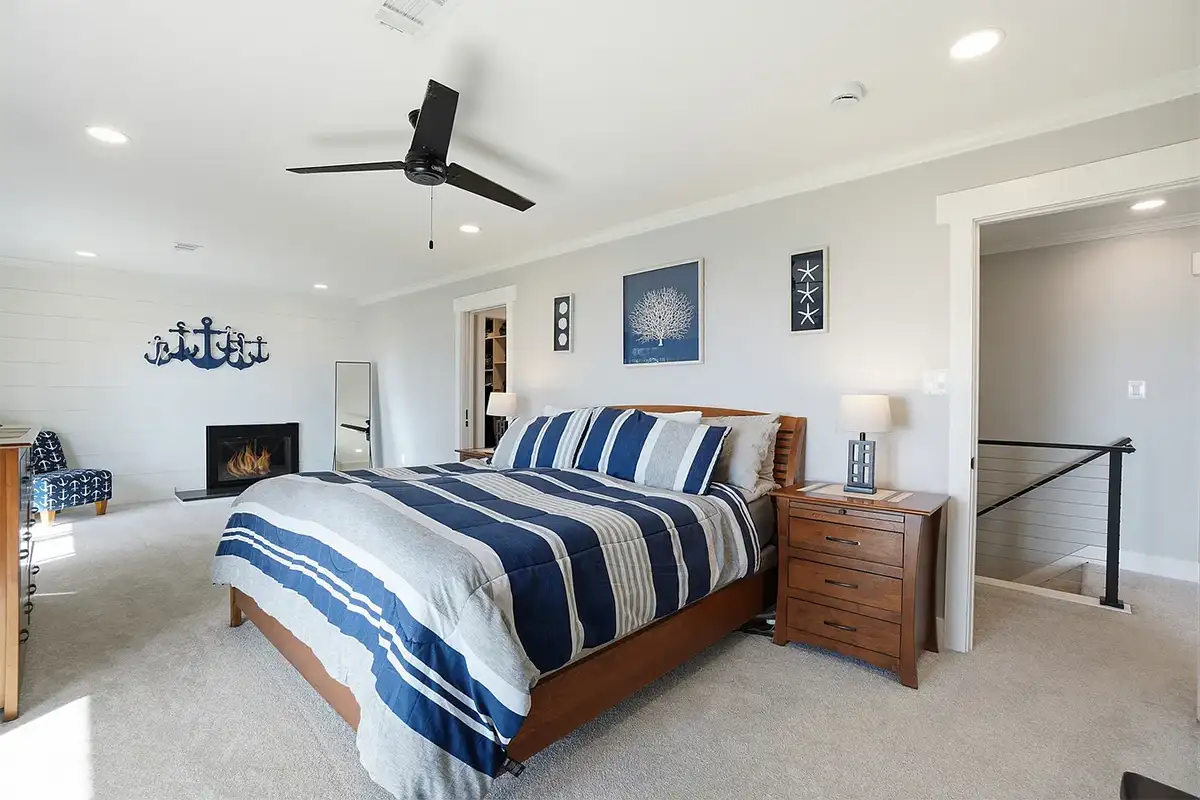 Primary bedroom of 6057 River Dr
