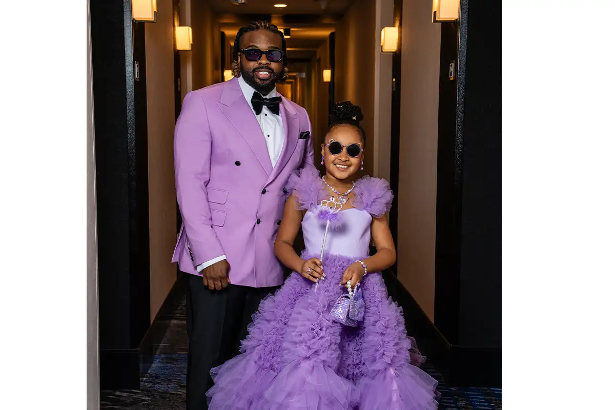 Aura V and her dad dressed in purple for the Grammy Awards ceremony