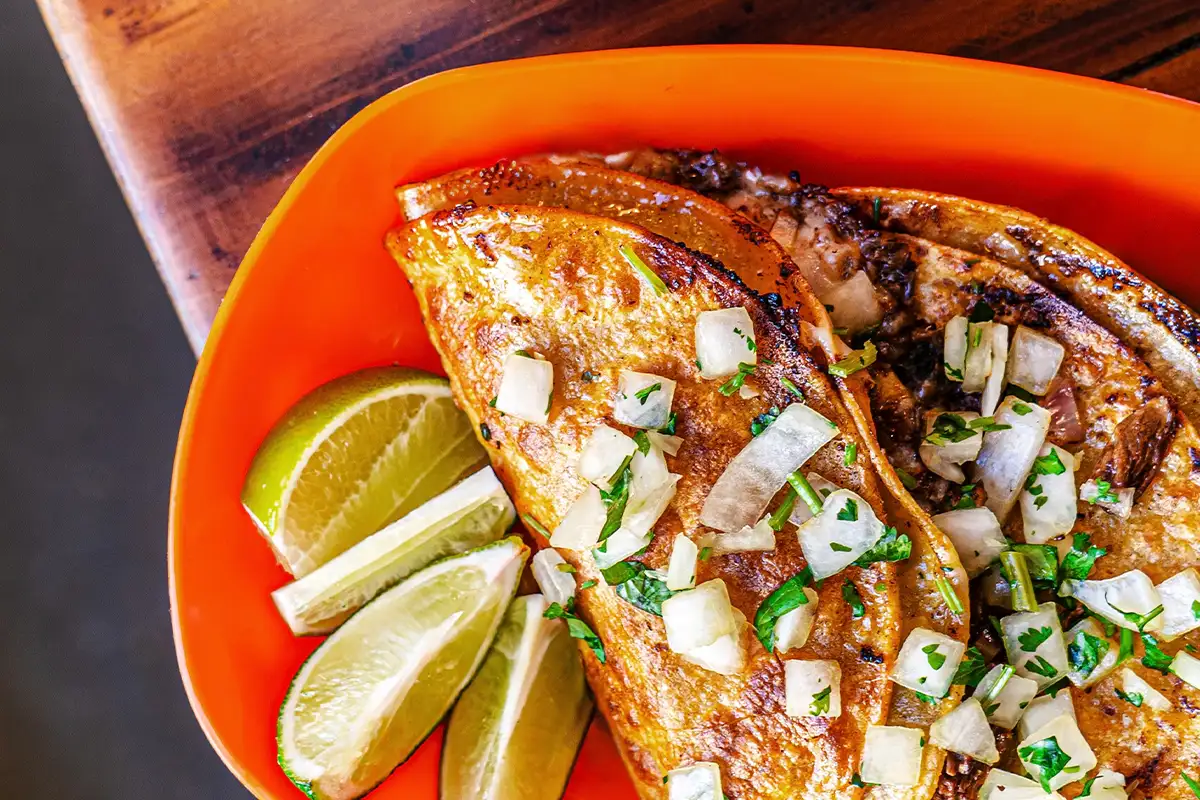 A plate of Mexican food from Eat More Taco