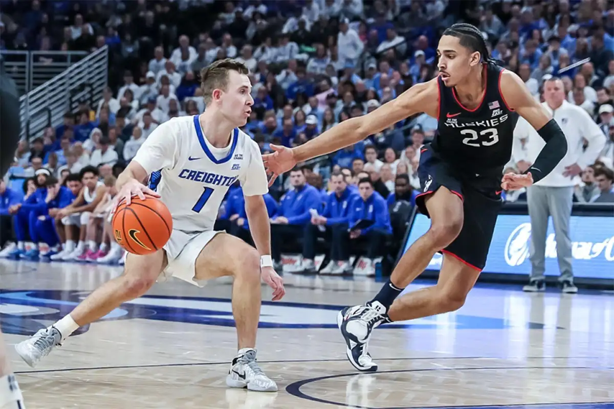 Omaha, NE. U.S. 11th Feb, 2025. - Creighton Bluejays guard Steven Ashworth (1) drives to the basket against Connecticut Huskies forward Jayden Ross (23) in action during a men's basketball game between UConn Huskies and #24 Creighton Bluejays at CHI Health Center in Omaha, NE